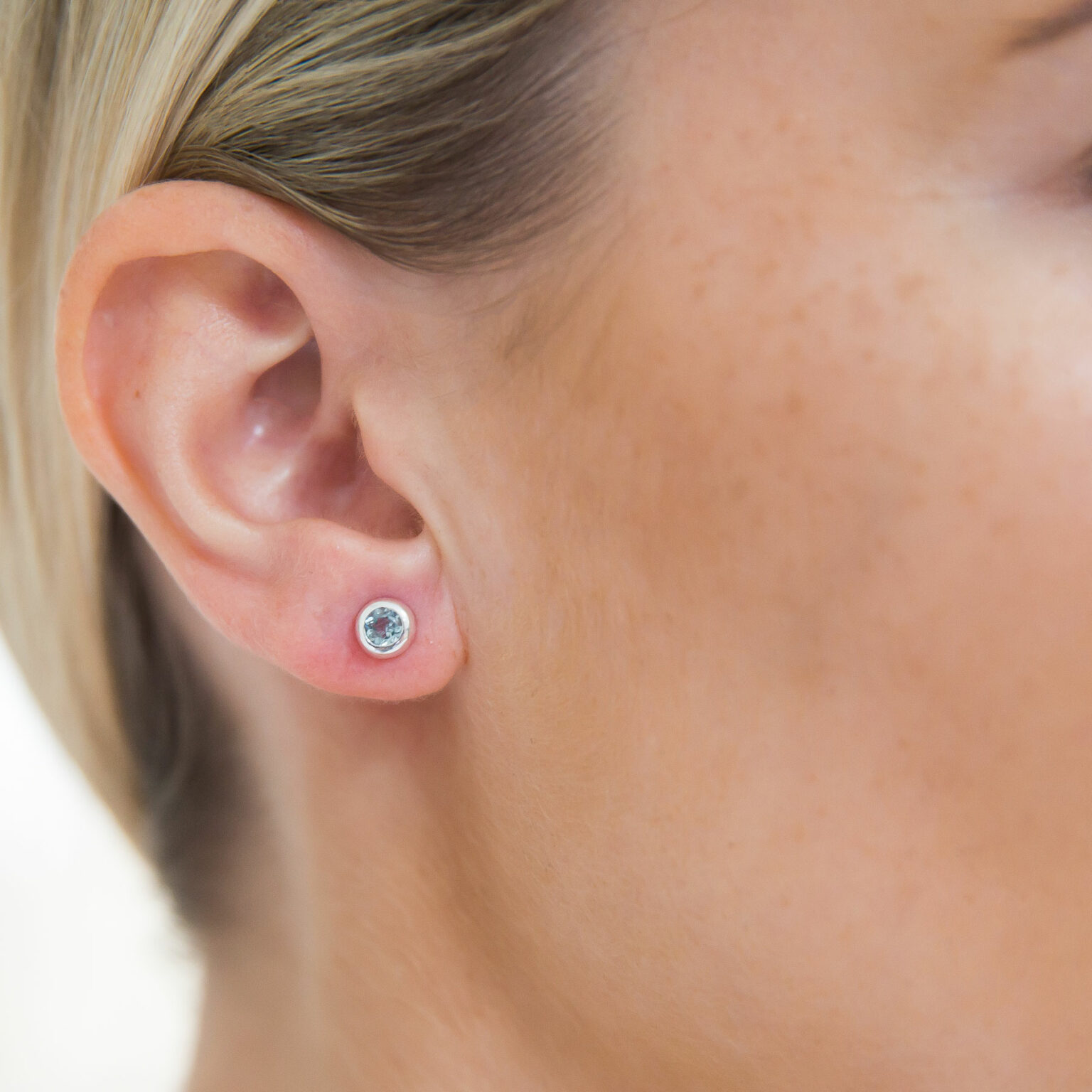 Blue topaz and silver stud earrings