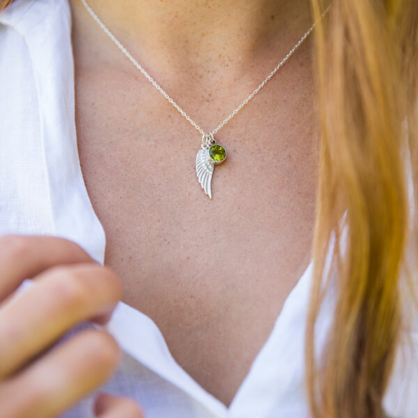 Silver angel wing and peridot birthstone necklace - Image 2