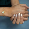 Gold and mother of pearl four leaf clover bracelet