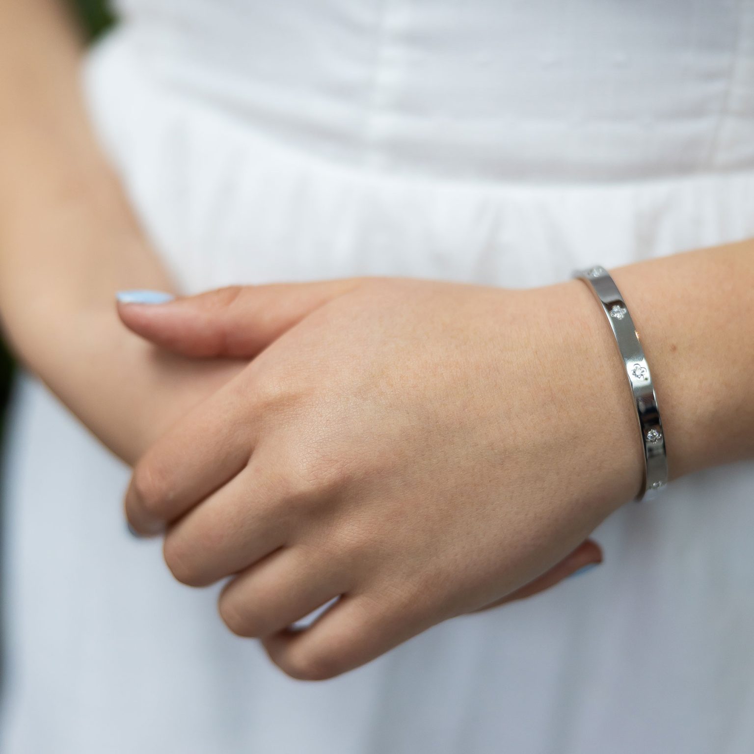 Silver-tone clover bangle with sparkle