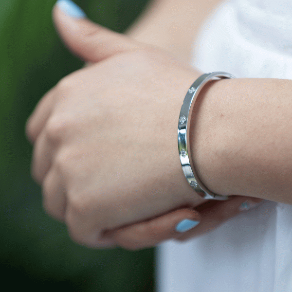 Silver clover bangle with a touch of sparkle