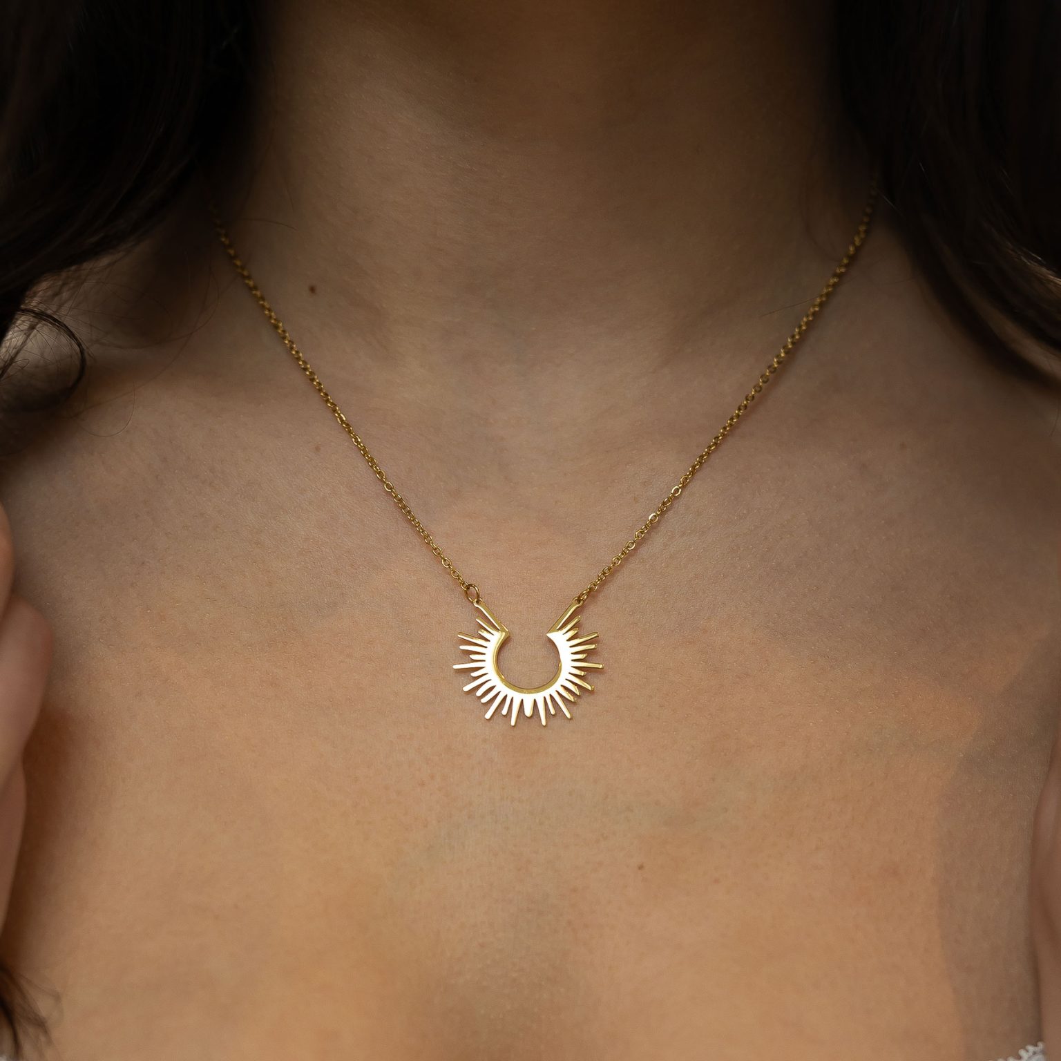 Gold-tone sunburst necklace