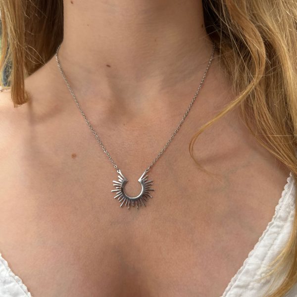 Silver-coloured sunburst necklace
