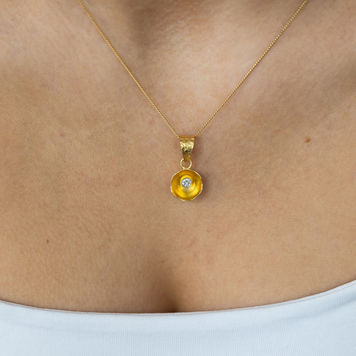 Brushed gold abstract flower necklace