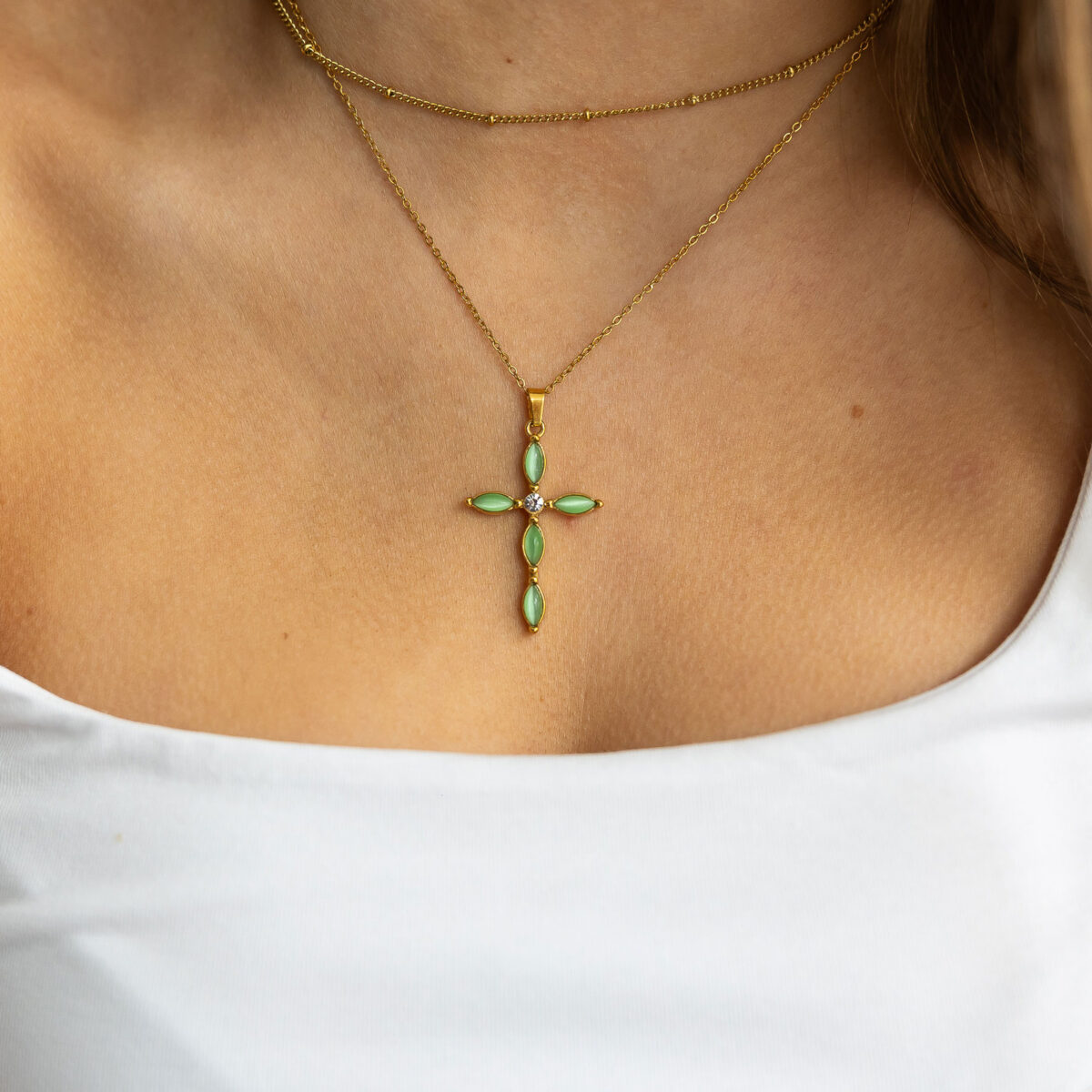 Green cross pendant necklace
