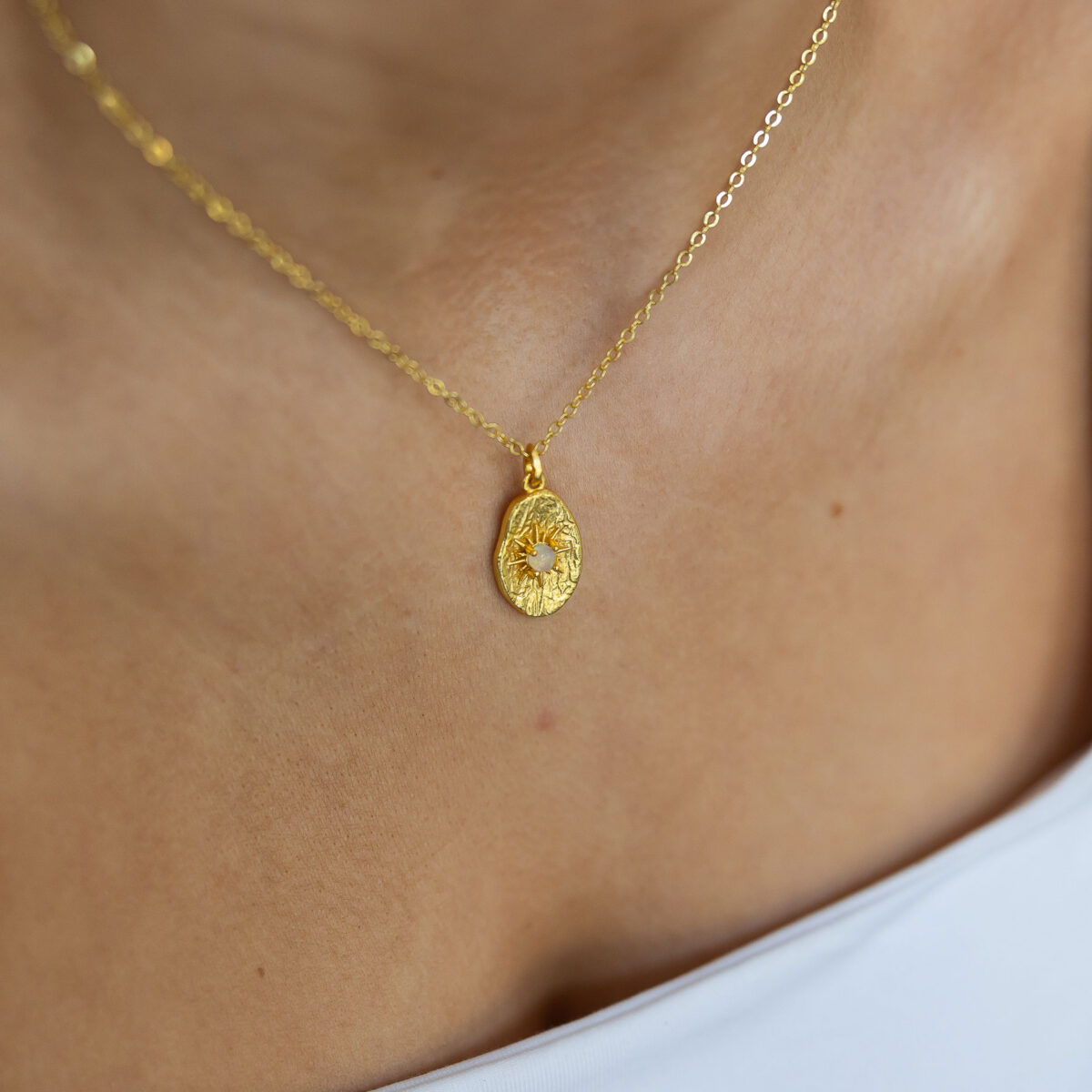 Opal and gold disc necklace