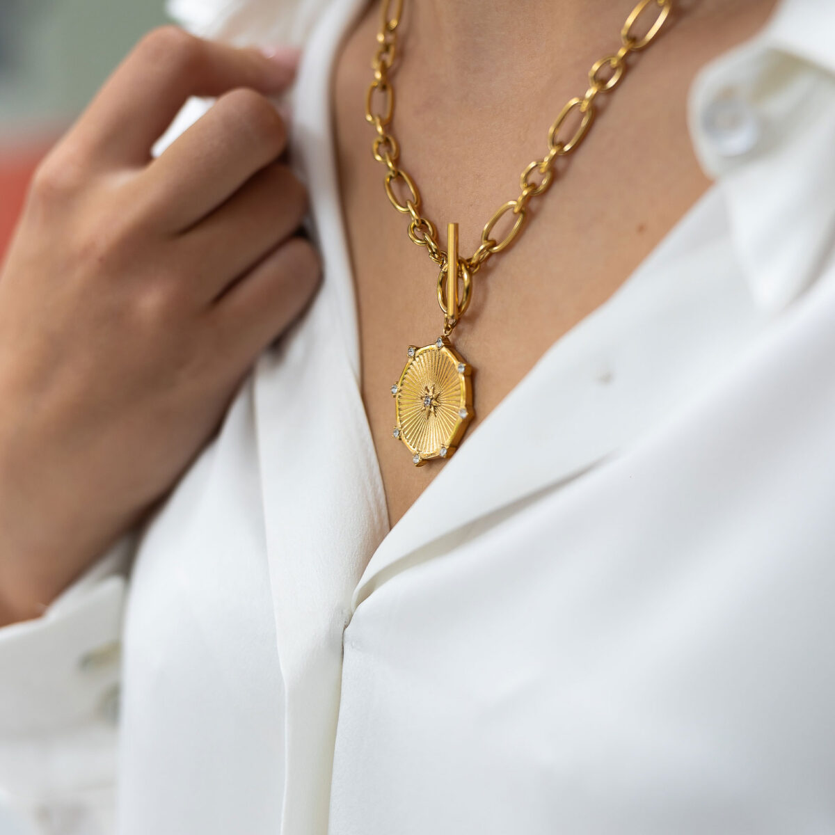 Shield pendant T-bar necklace