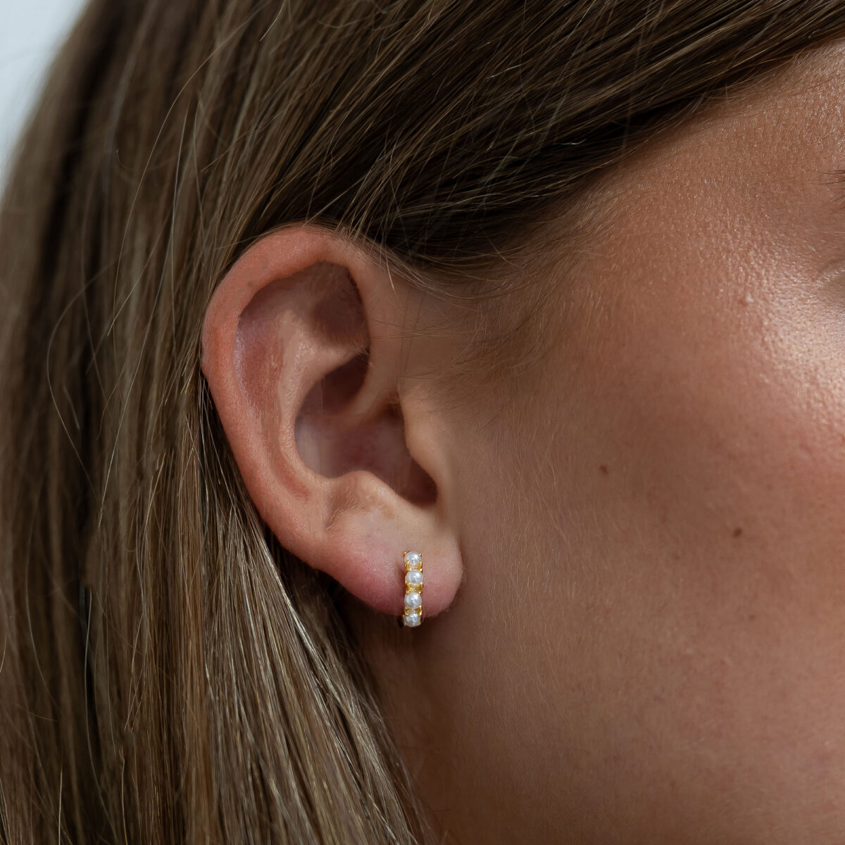 Pearl huggie earrings